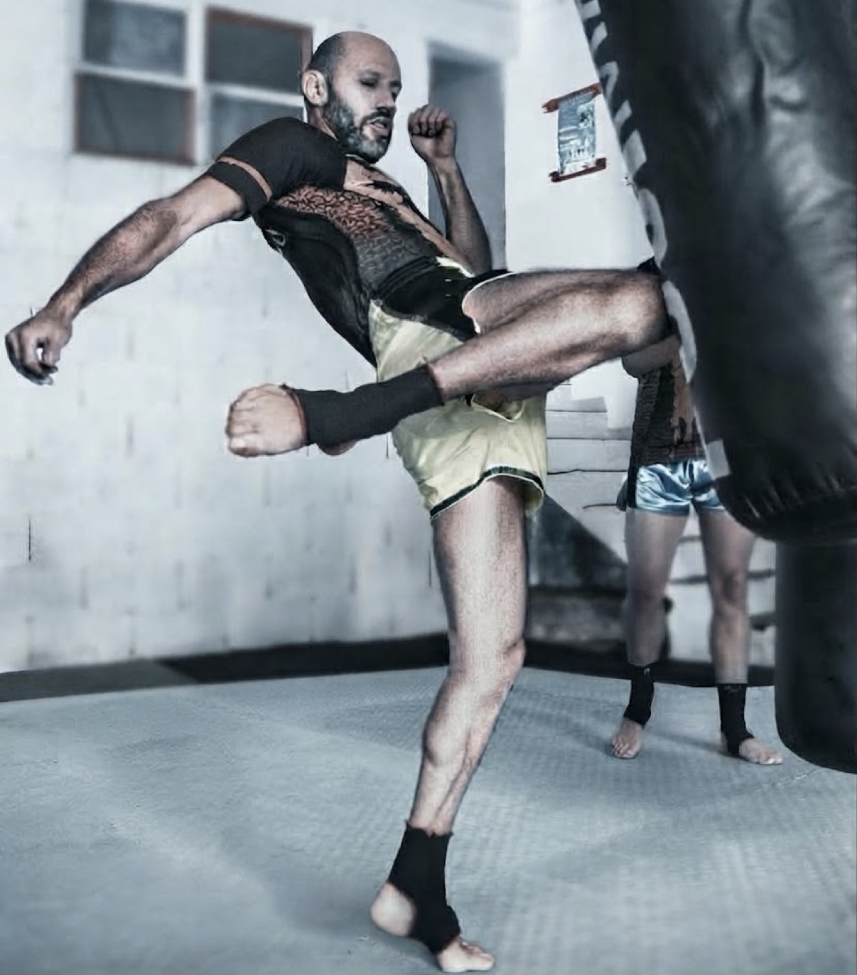 Kicking the heavy bag