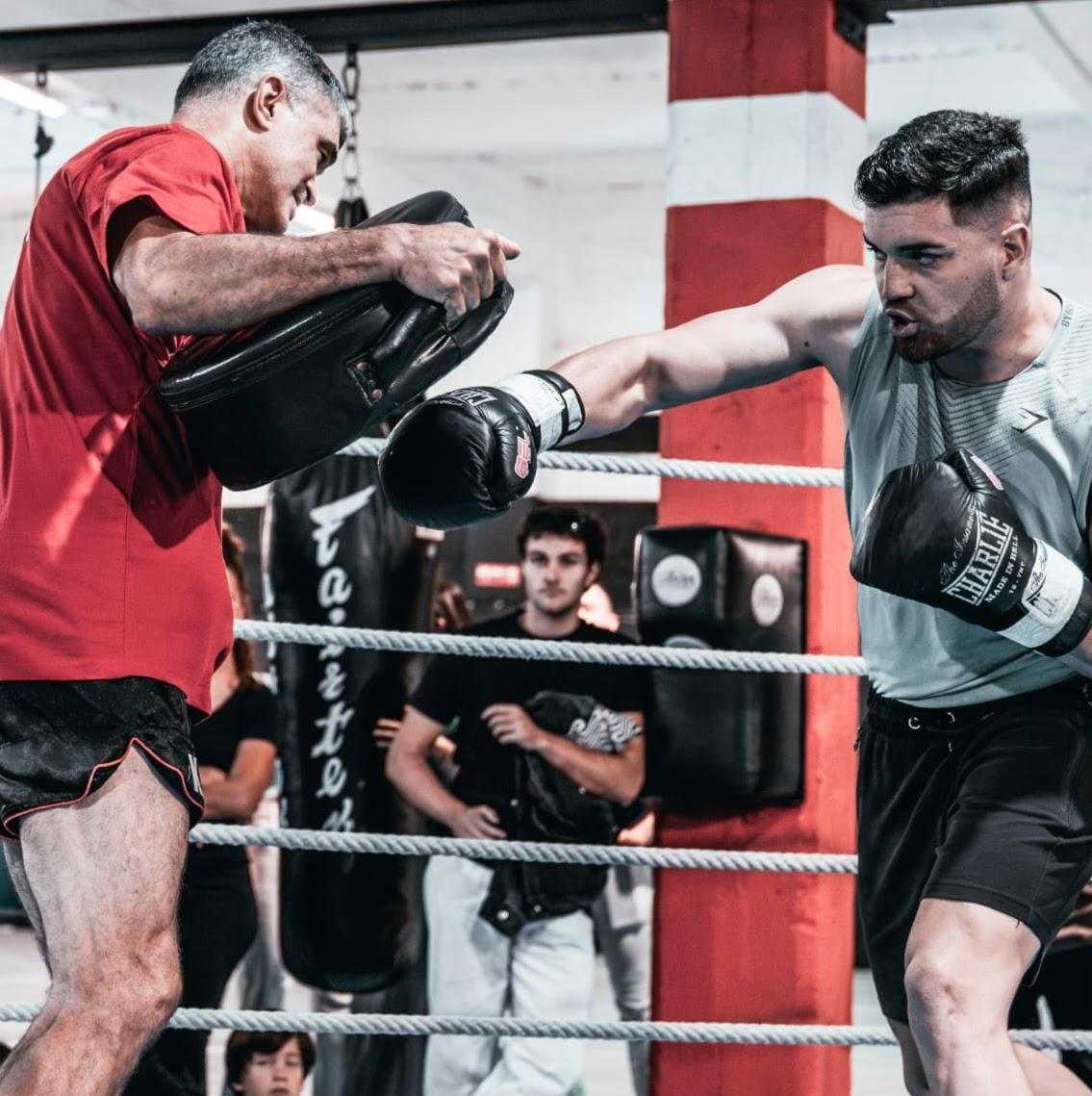Pad work with coach in the ring